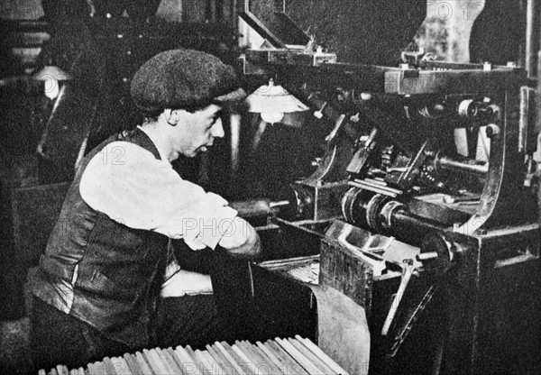 male machine operator in a pencil factory circa 1925