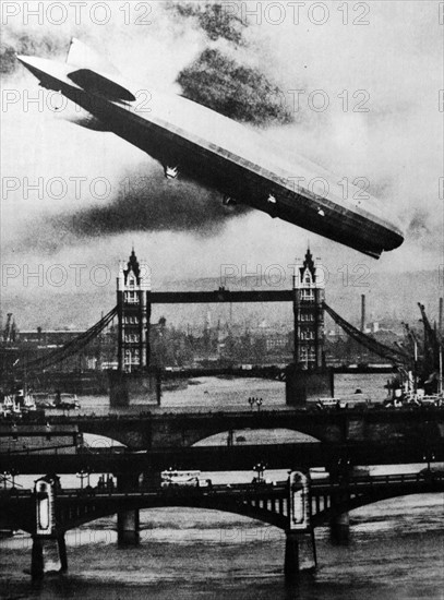 The German airship the Graff Zeppelin flies over Tower Bridge