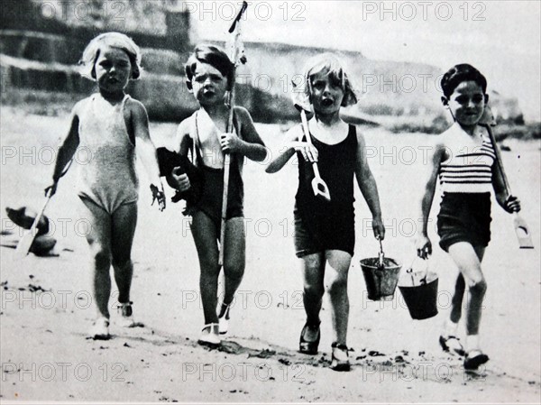 Children enjoying a visit to a beach resort
