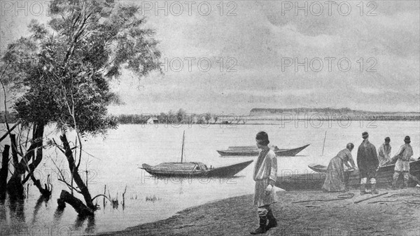 Peasants near boats on the Obi river in Siberia