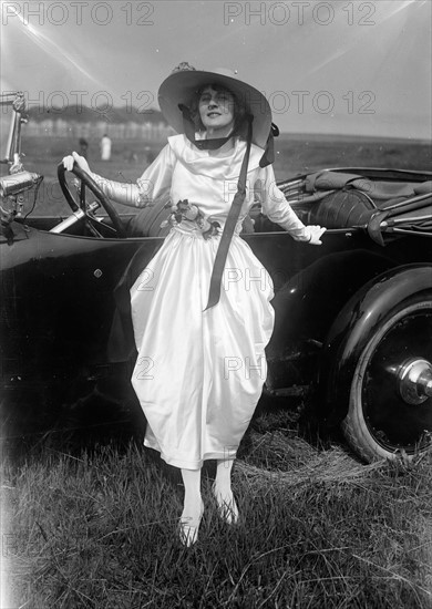 American silent film star Gertrude McCoy in her Oldsmobile 1917