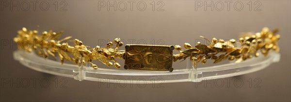 Gold myrtle wreath with die-formed head of Athena in central plaque
