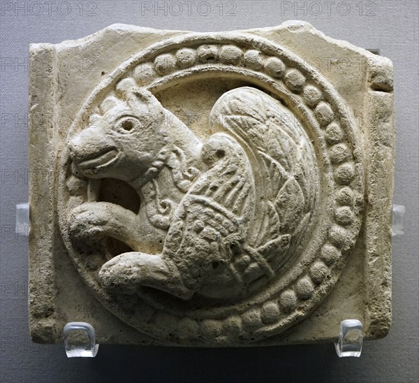 Stucco plaque of a Simurgh