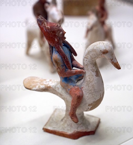 Terracotta figure of a man riding a goose