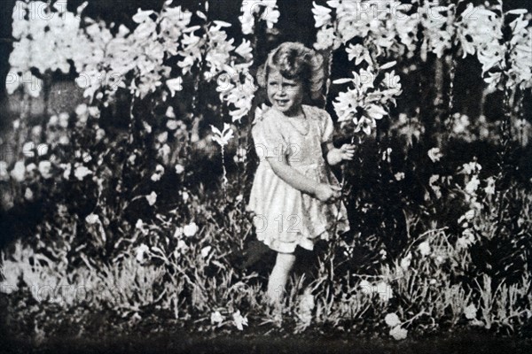 Princess Elizabeth playing amongst flowers