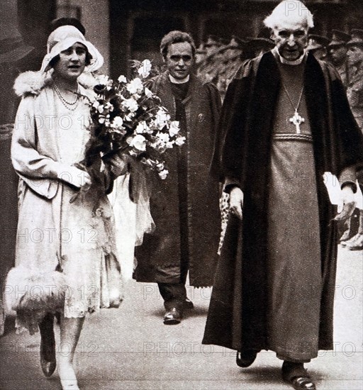 The Archbishop of Canterbury walking with Lady Elizabeth