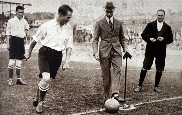 Prince Albert kicking off a football match