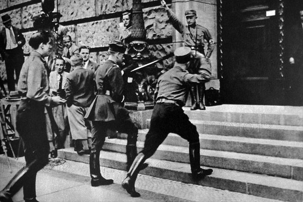 Photographic print shows National Socialists arriving at the first meeting in the German Parliament