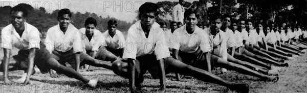 the boys of St. Bede's College exercising