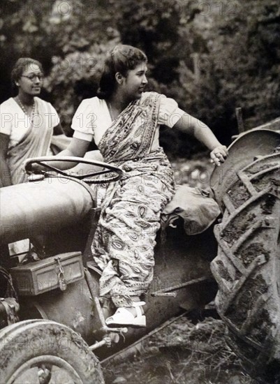 Ceylon Farmerettes leering to drive tractors in England