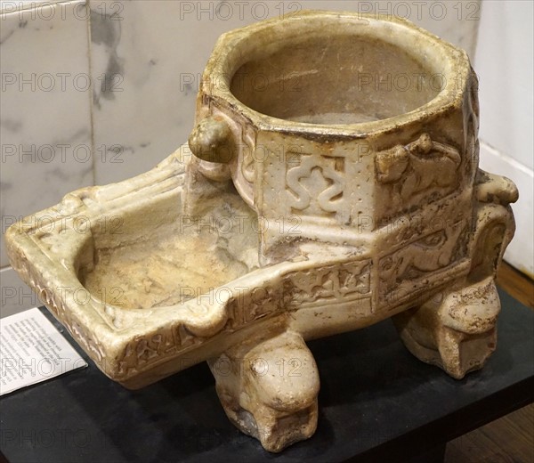 Marble jar stand with crouched lions with eagles from Egypt