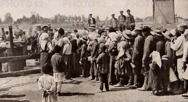 Distribution of food to civilians near Warsaw Poland.