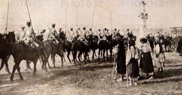 Galician peasants watch the withdrawal of Russian forces.