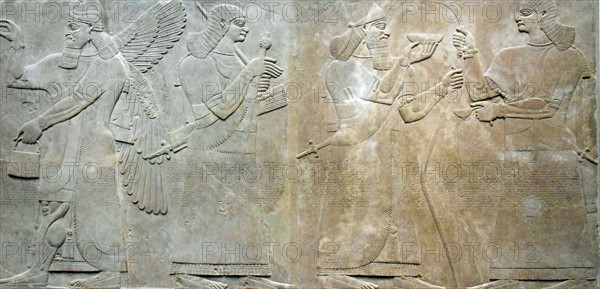 relief depicting a king and eunuch attendant