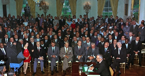 The Civil Rights Act of being enacted by President Lyndon Johnson, July 2, 1964.