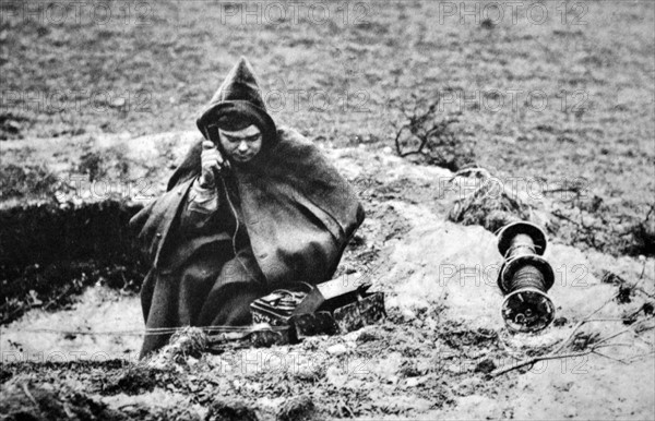 WWII: French army radio operator telephones instructions at a front line position 1940