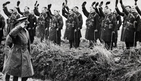 King George VI of Britain greeted by British soldiers in France