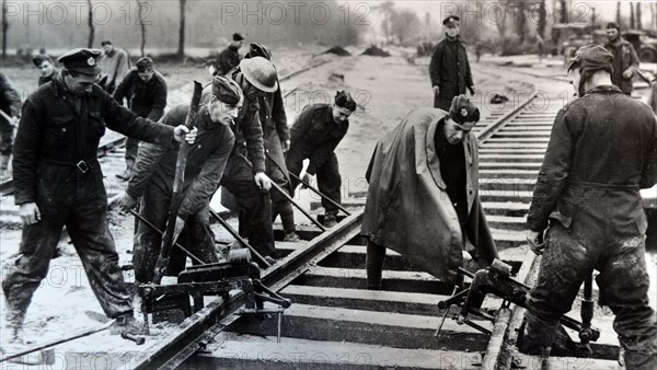 British soldiers fix railway tracks in northern France, during the battle of France 1940