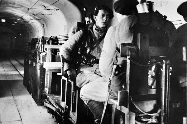 French soldiers move by rail cart, 1940