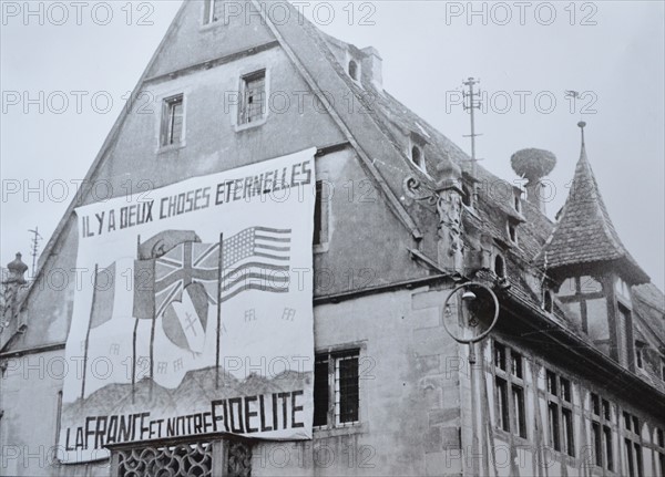 signs marking the liberation of a town in the Alsace Lorraine region 1944