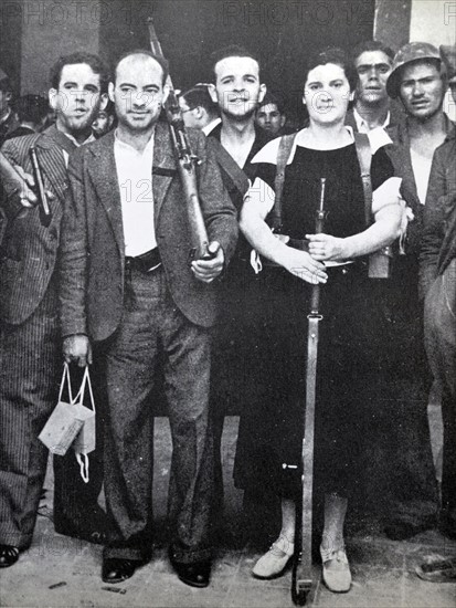 A female fighter with republican soldiers during the Spanish civil war, Barcelona 1937