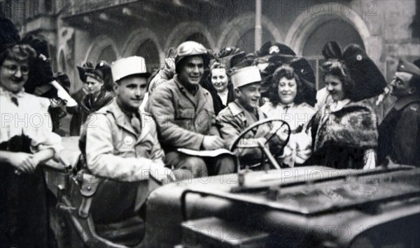 American & French liberators in a town in Alsace Lorraine after liberation from Germany in WWII