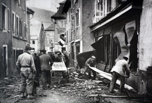 Citizens attempt to clear damaged buildings in Alsace Lorraine, 1944