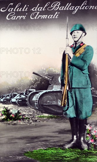 Italian world War Two postcard showing an infantry soldier with rifle near a line of tanks