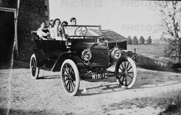 Car and Corner of Carriage House