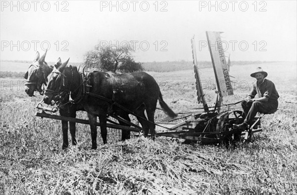 Jewish farmer with modern machinery in Palestine