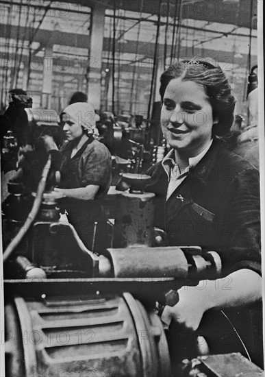 Women handling lathe in a factory in the USSR