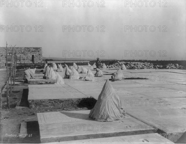 Hired mourners in a cemetry in Tunisia