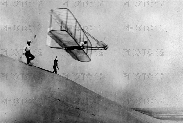 A glider test by the Wright Brothers