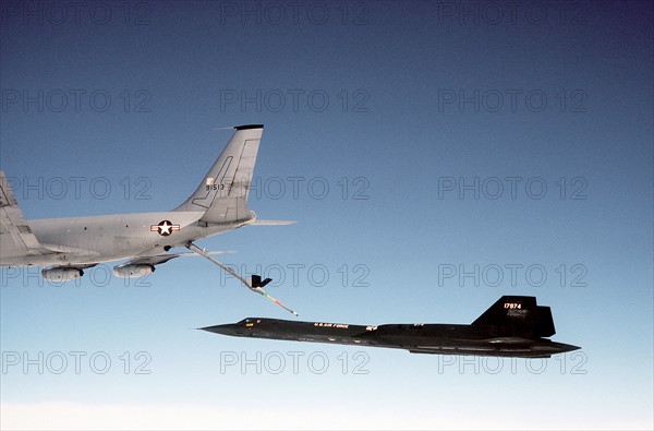 Photograph of Plane Refuelling Mid Flight