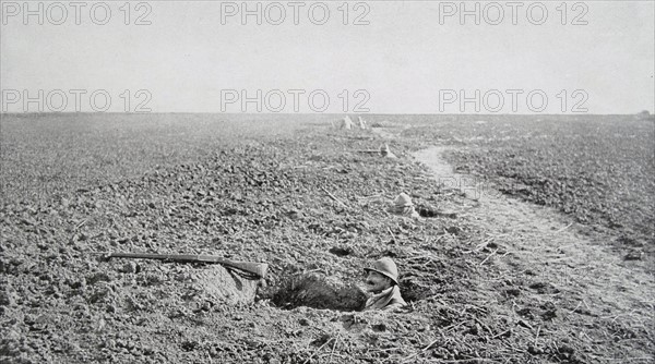 French soldiers in foxholes in France during the spring of 1918. WWI