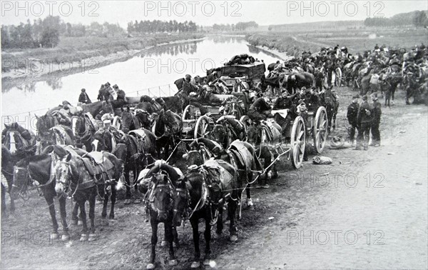 Belgian forces retreat during the early stages of WWI.