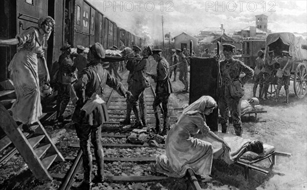 An WWI ambulance train stops at a field hospital in France