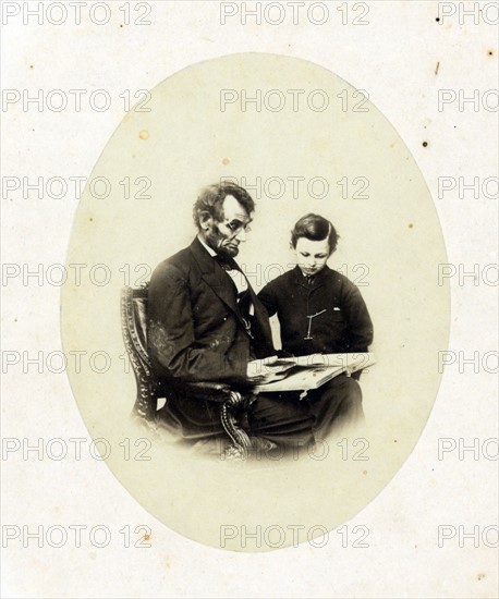 Abraham Lincoln with his son, Tad
