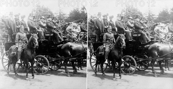 President McKinley and others in a horse-drawn carriage.