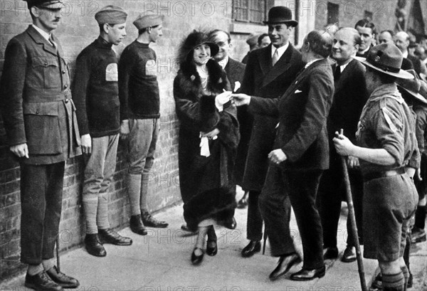 Duchess receiving a key which opened the new club.