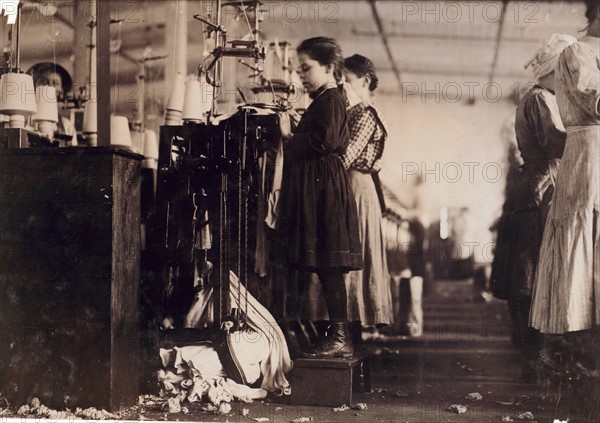 Photograph of a young girl employed as a knitter