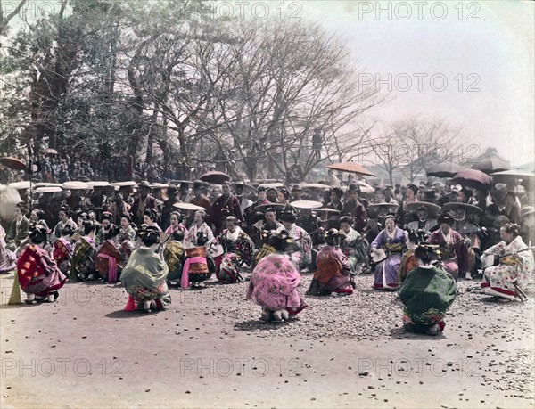 Colour photograph of Japanese Women in Kimonos dancing