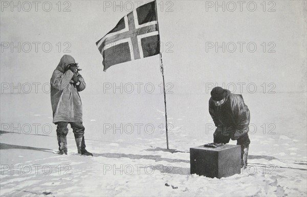 Captain Roald Amundsen taking sights at the South Pole.