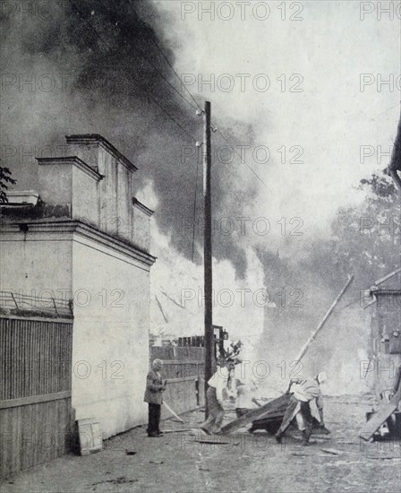 Photograph showing the aftermath of a Nazi bomb attack in a Warsaw suburb