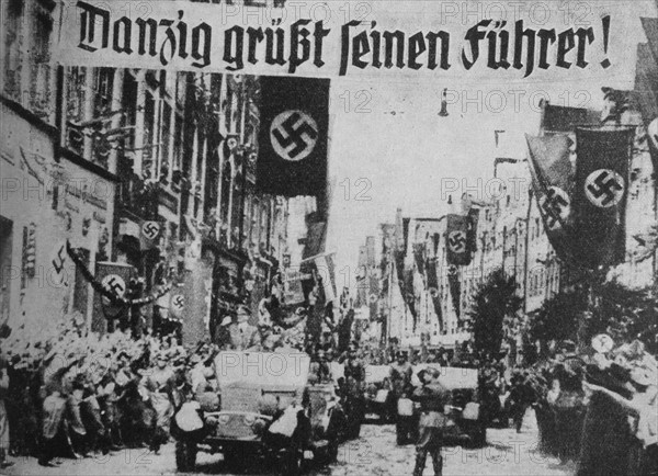 Photograph of a parade in Danzig greeting Hitler