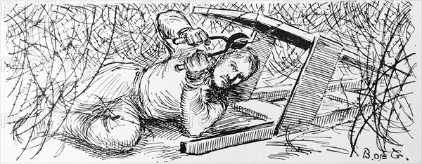 World war one Allied saboteur, gets under a barbed wire fence