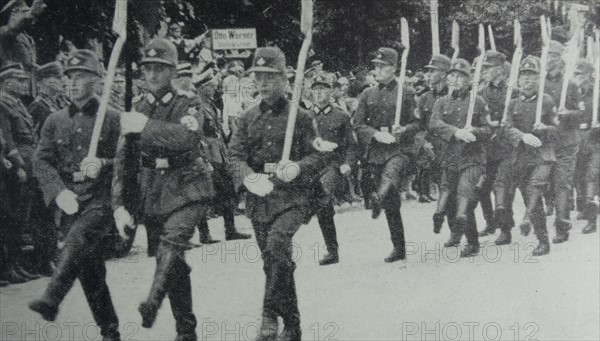 Photograph of young men marching in Danzig