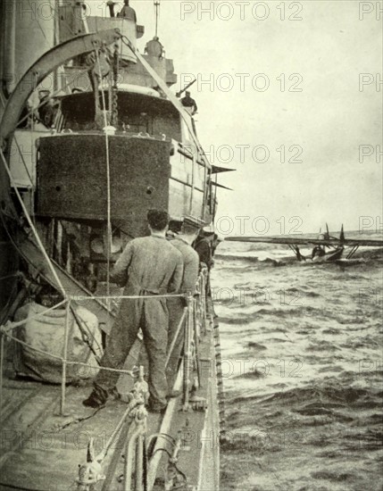 Photograph of the crew of the German aircraft brought down is being rescued by a British Destroyer