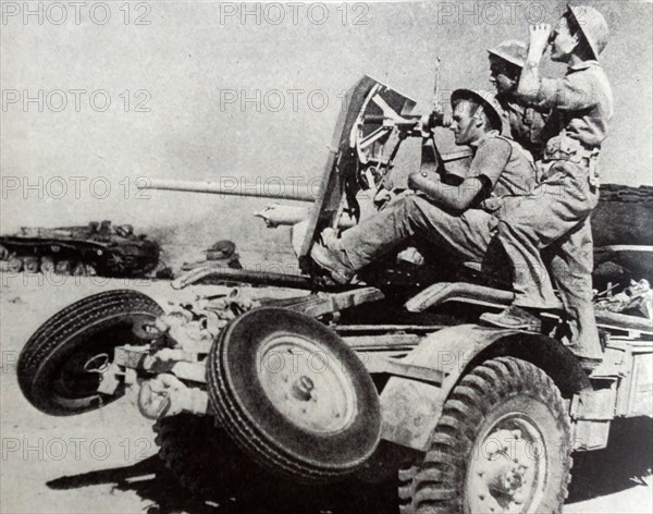 Photograph of Infantry and Anti-tank gunners in the Knightsbridge fighting.