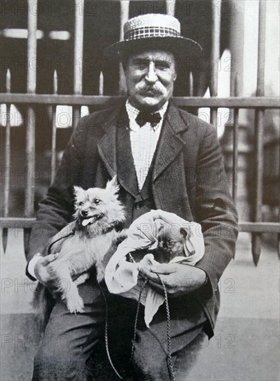 Man with dogs, Belgium 1910